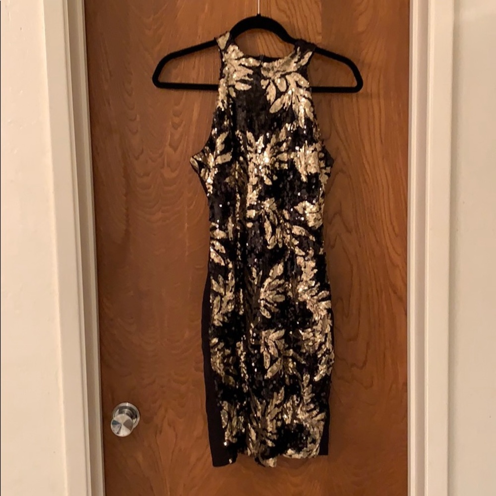 Black and gold sequined dress